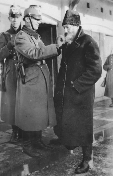 Police Humiliating a Jewish Man